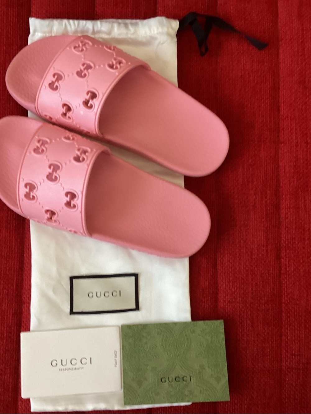 Gucci Pink GG Rubber Slide Sandals
